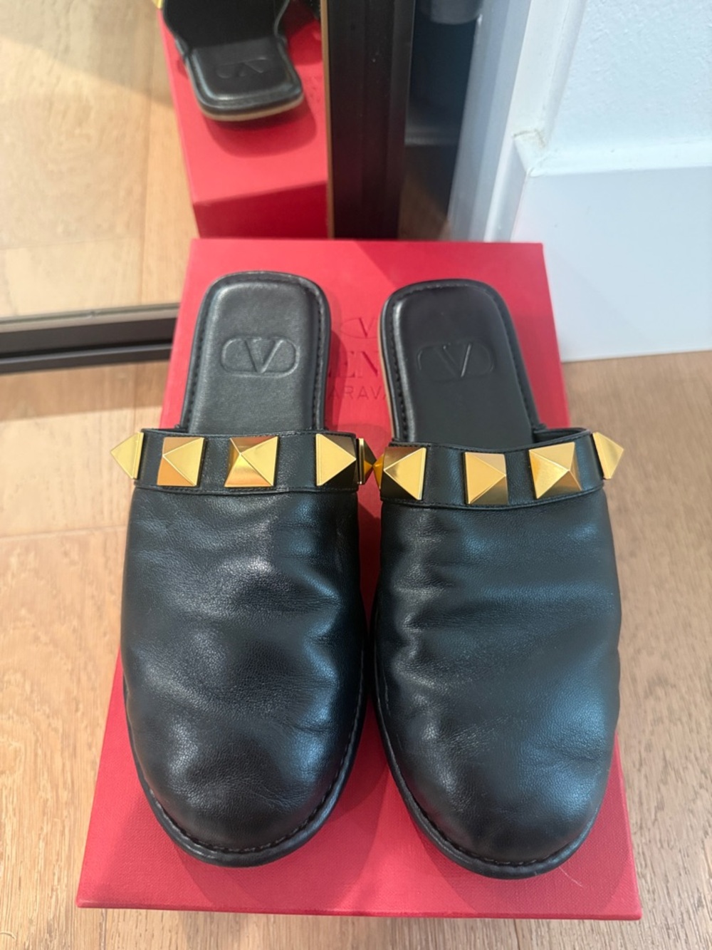 Valentino Black Leather Slides with Gold Pyramid Studs